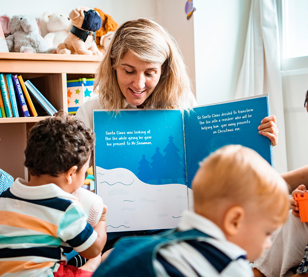 A teacher is reading a storybook to the children, engaging them with animated storytelling and colorful illustrations,